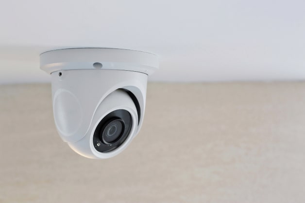 security camera attached to ceiling